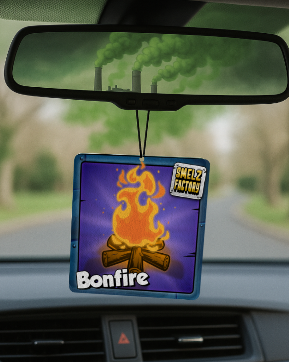 Car air freshener with 'Bonfire' design hanging from a car's rearview mirror.