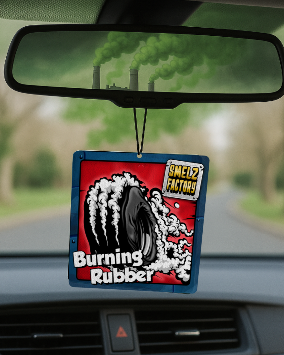 Car air freshener with 'Burning Rubber' design hanging from a car's rearview mirror.
