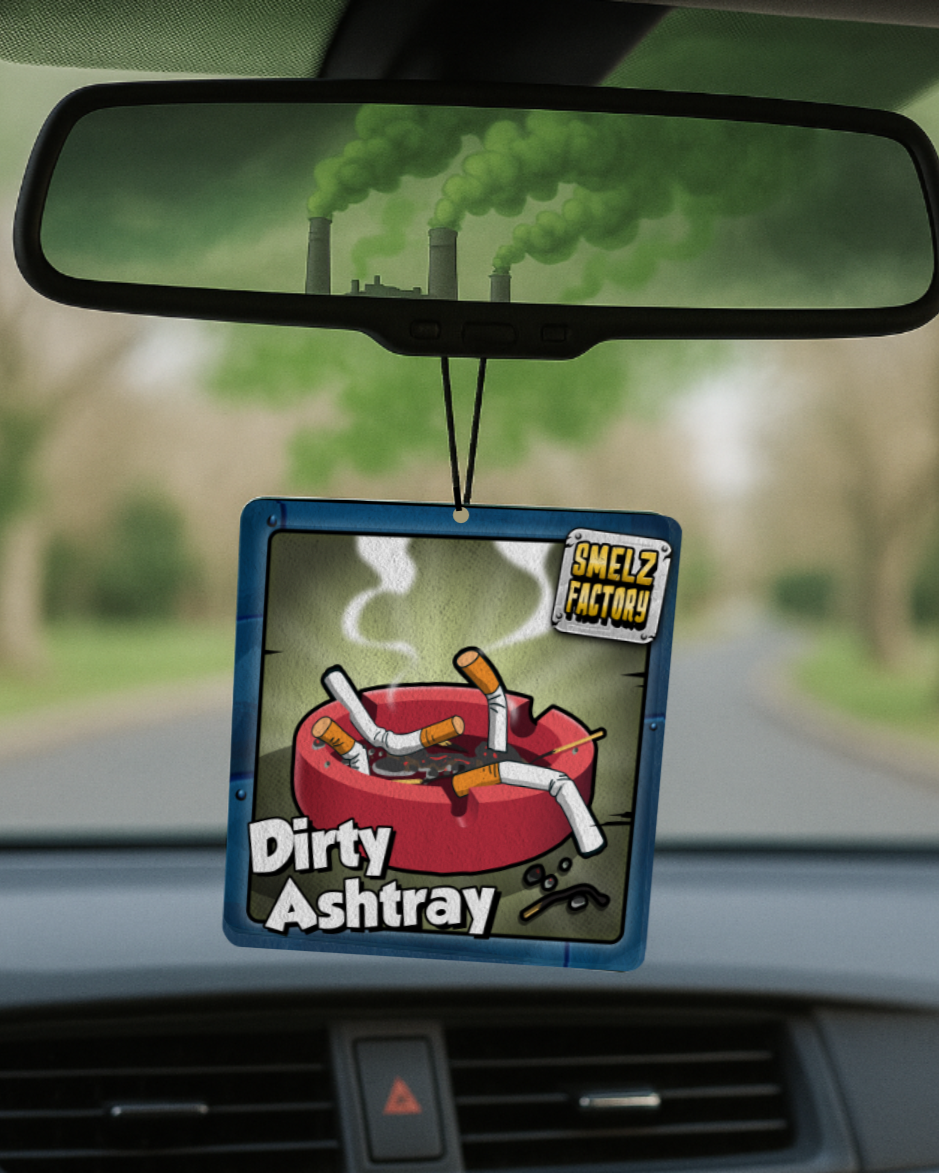 Car air freshener with 'Dirty Ashtray' design hanging from a car's rearview mirror.