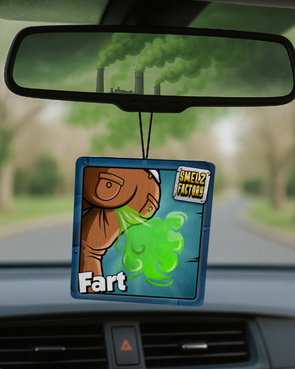 Car air freshener with cartoon character and 'Fart' text hanging from a car's rearview mirror.