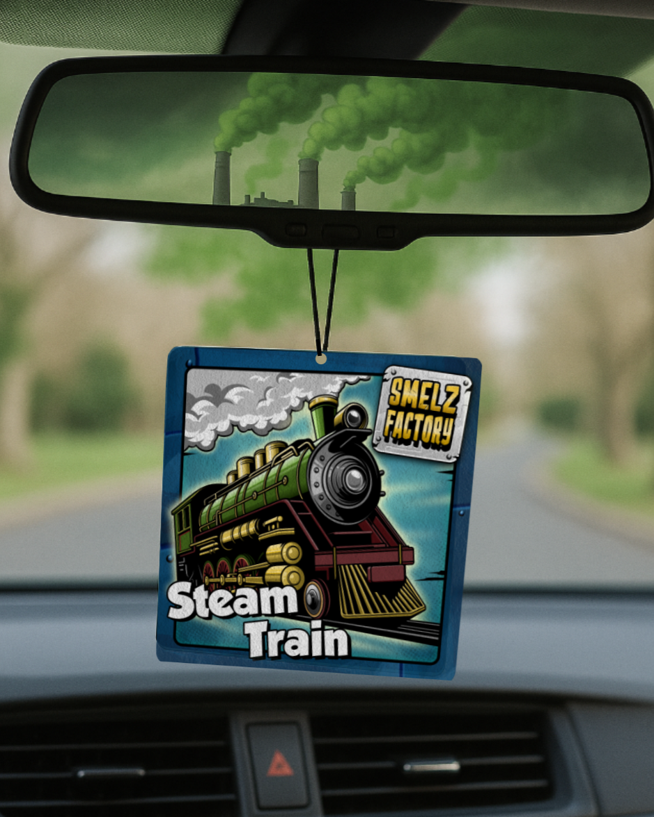 Car air freshener with a steam train design hanging from a car's rearview mirror.